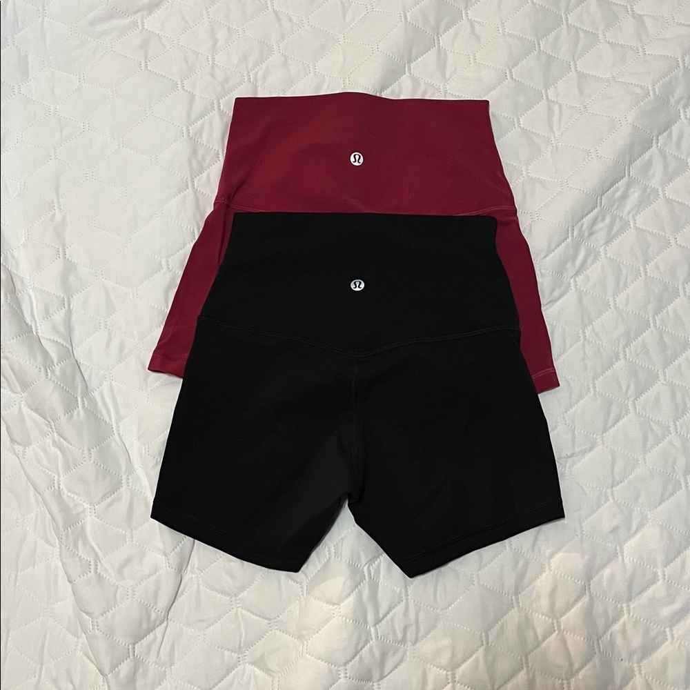 lululemon 4” high rise Women's Bike Shorts in black and red. Both for $40